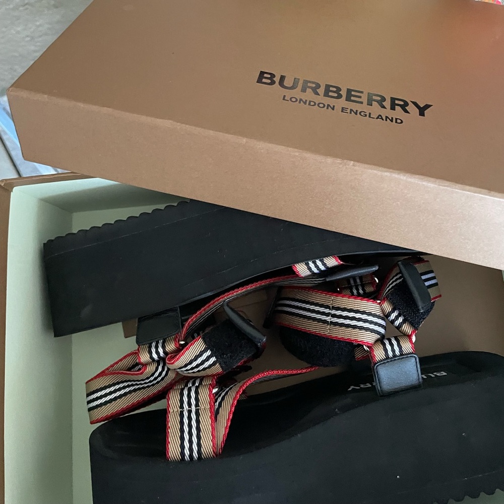 Burberry platform dad sandals.